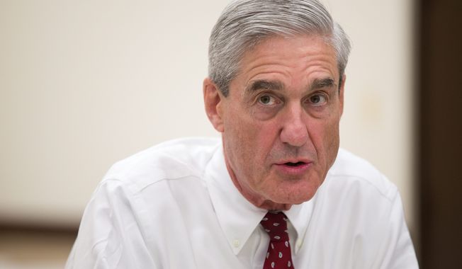 Special counsel Robert Mueller, who this year hired a staff of 16 lawyers with significant experience prosecuting such financial crimes, is focused on unraveling the Trump family&#x27;s tangled financial and real estate empire in a bid to find any connections to &quot;dark money&quot; investments from Russian oligarchs and organized crime figures, a source said. (Associated Press/File)

