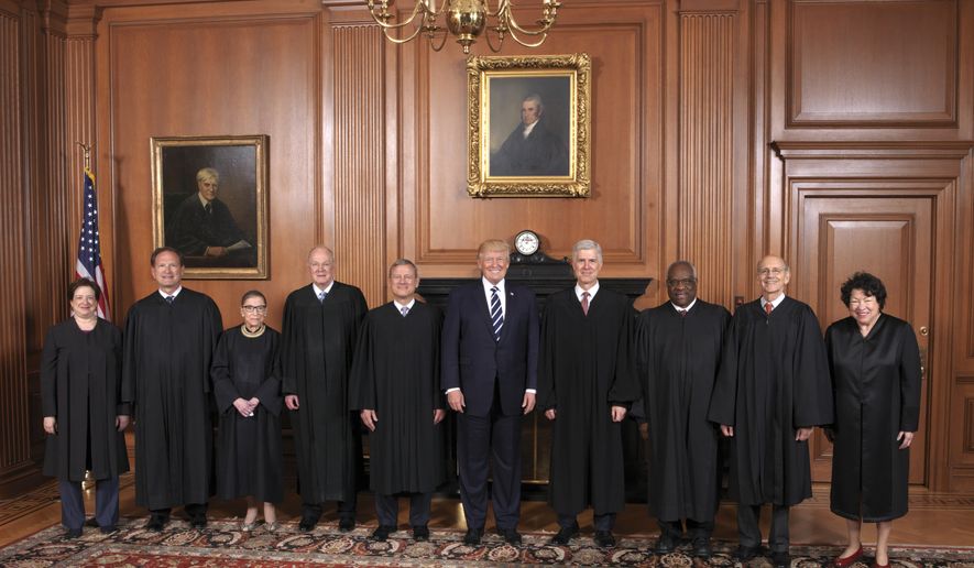 In this image provided by the Supreme Court, President Donald Trump poses with members of the Supreme Court, Thursday, June 15, 2017, at the court in Washington. From left are, Associate Justices Elena Kagan, Samuel A. Alito, Jr., Ruth Bader Ginsburg, and Anthony Kennedy, Chief Justice John Roberts, Jr., the president, Associate Justices Neil Gorsuch, Clarence Thomas, Stephen G. Breyer, and Sonia Sotomayor.  (Fred Schilling/Supreme Court via AP)    The Supreme Court held a special sitting on June 15, 2017, for the formal investiture ceremony of Associate Justice Neil M. Gorsuch. President Donald J. Trump and First Lady Melania Trump attended as guests of the Court. Members of the Supreme Court with the President in the Justices&#39; Conference Room at a courtesy visit prior to the investiture ceremony.