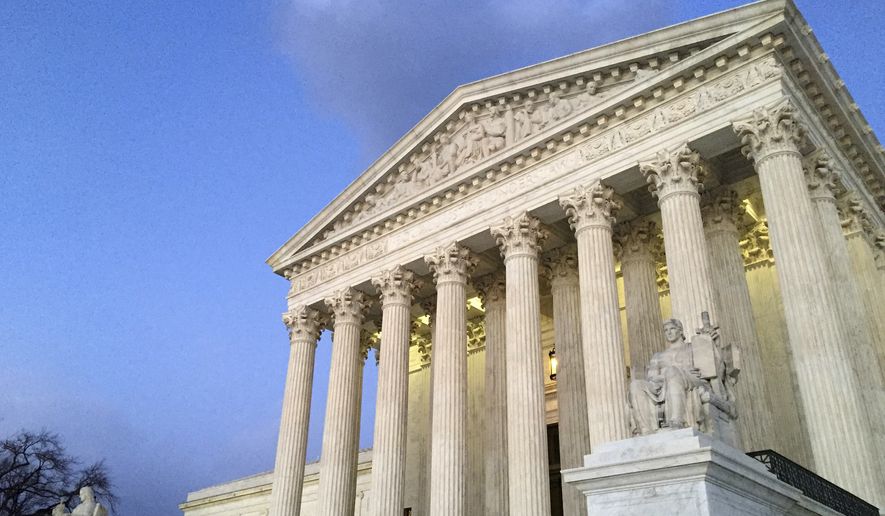 People stand on the steps of the Supreme Court at sunset in Washington, Feb. 13, 2016. (AP Photo/Jon Elswick) ** FILE **
