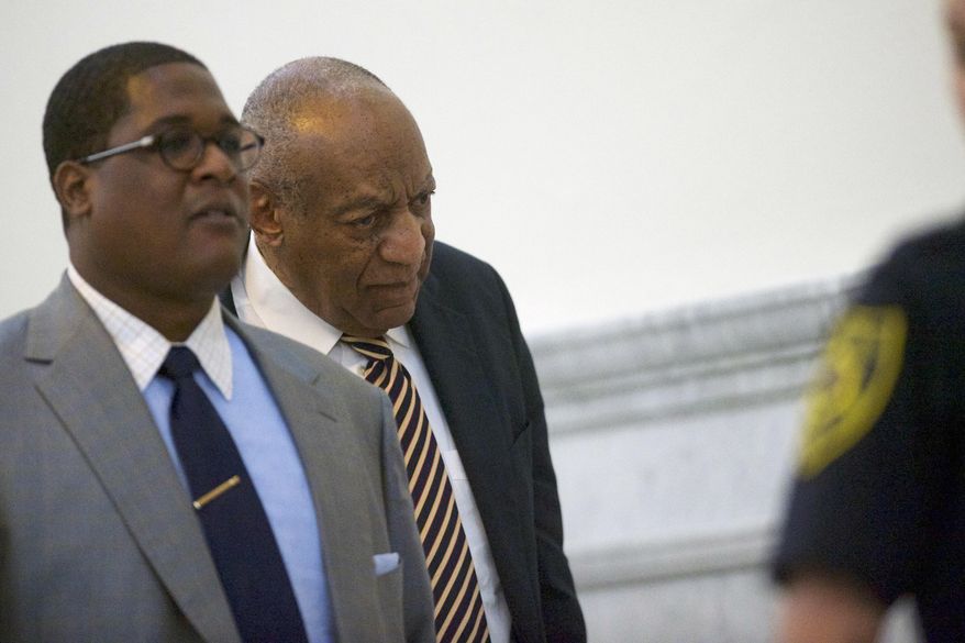 Bill Cosby exits the courtroom during his sexual assault trial at the Montgomery County Courthouse in Norristown, Pa., Wednesday, June 14, 2017. (Mark Makela/Pool Photo via AP)