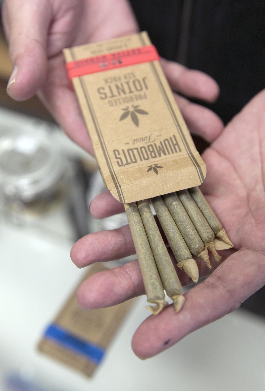 Pre rolled marijuana cigarettes are displayed at the Canna Care medical marijuana dispensary Wednesday, June 14, 2017, in Sacramento, Calif. Tucked in the state budget agreement reached between Gov. Jerry Brown and top legislative Democrats, are standards to merge the state's new voter-approved recreational marijuana law with the long-standing medical marijuana program. Lawmakers are expected to vote on the budget plan, Thursday. (AP Photo/Rich Pedroncelli)