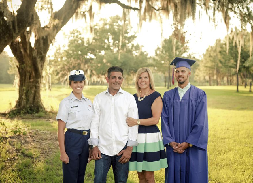 This undated portrait made available by Rebecca Vann Photography shows Rudy Blanco, his wife Shelly, daughter Hannah and son Noah in Perry, Florida. Rudy Blanco was 8 when he was brought from the port of Mariel by his parents in 1980. He now has a family and owns a home-remodeling business in Perry, Florida. Because he was convicted of attempting to sell cocaine in 1998, he wasn’t allowed to become a U.S. citizen and instead received an order of deportation by mail in 2005. Blanco was allowed to stay as long as he made routine visits to Immigration and Customs Enforcement. However, he was arrested on May 9 and is now awaiting deportation. (Rebecca Vann Photography via AP)
