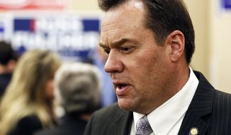 FILE - In this May 20, 2014 file photo former state Sen. Russ Fulcher talks to reporters while waiting election results in Boise, Idaho. Fulcher announced Thursday, June 15, 2017, he&#39;s dropping out of the 2018 gubernatorial race to run for the state&#39;s 1st Congressional District. (AP Photo/Otto Kitsinger, File)