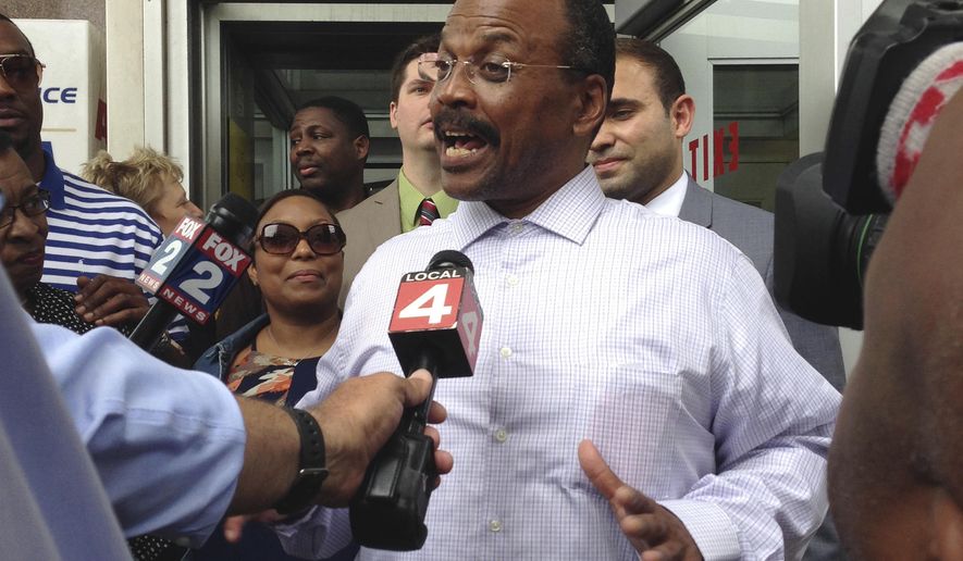 Ledura Watkins, 61, greets family and supporters following his release Thursday, June 15, 2017 from the Wayne County Jail in Detroit. Watkins was convicted in 1976 of first-degree murder in a Detroit woman's slaying. Prosecutors are no longer confident in the hair evidence used to convict him. Western Michigan University-Cooley Law School's Innocence Project helped Watkins fight for his release. His conviction has been set aside. (AP Photo/Corey Williams)