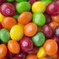 This June 1, 2016, file photo shows Skittles in New York. Skittles has temporarily ditched its rainbow theme in favor of an all-white look in the United Kingdom and Germany in order to celebrate LGBT pride. (AP Photo/Mark Lennihan, File)