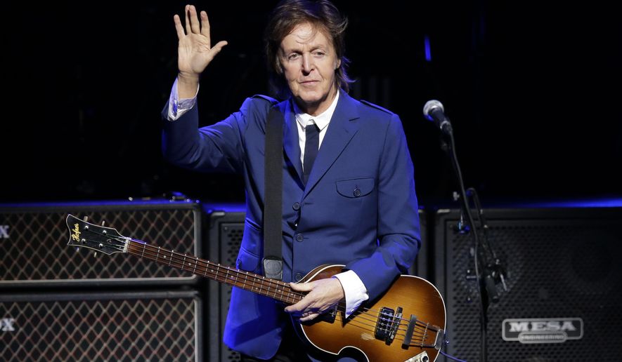 FILE- In this Wednesday, Oct. 1, 2014 file photo, Paul McCartney performs during a benefit concert at the Tobin Center, in San Antonio, Texas. Paul McCartney and J.K. Rowling just got promoted, so to speak, in Britain’s hierarchy, Friday, June 16, 2017. (AP Photo/Eric Gay, File)