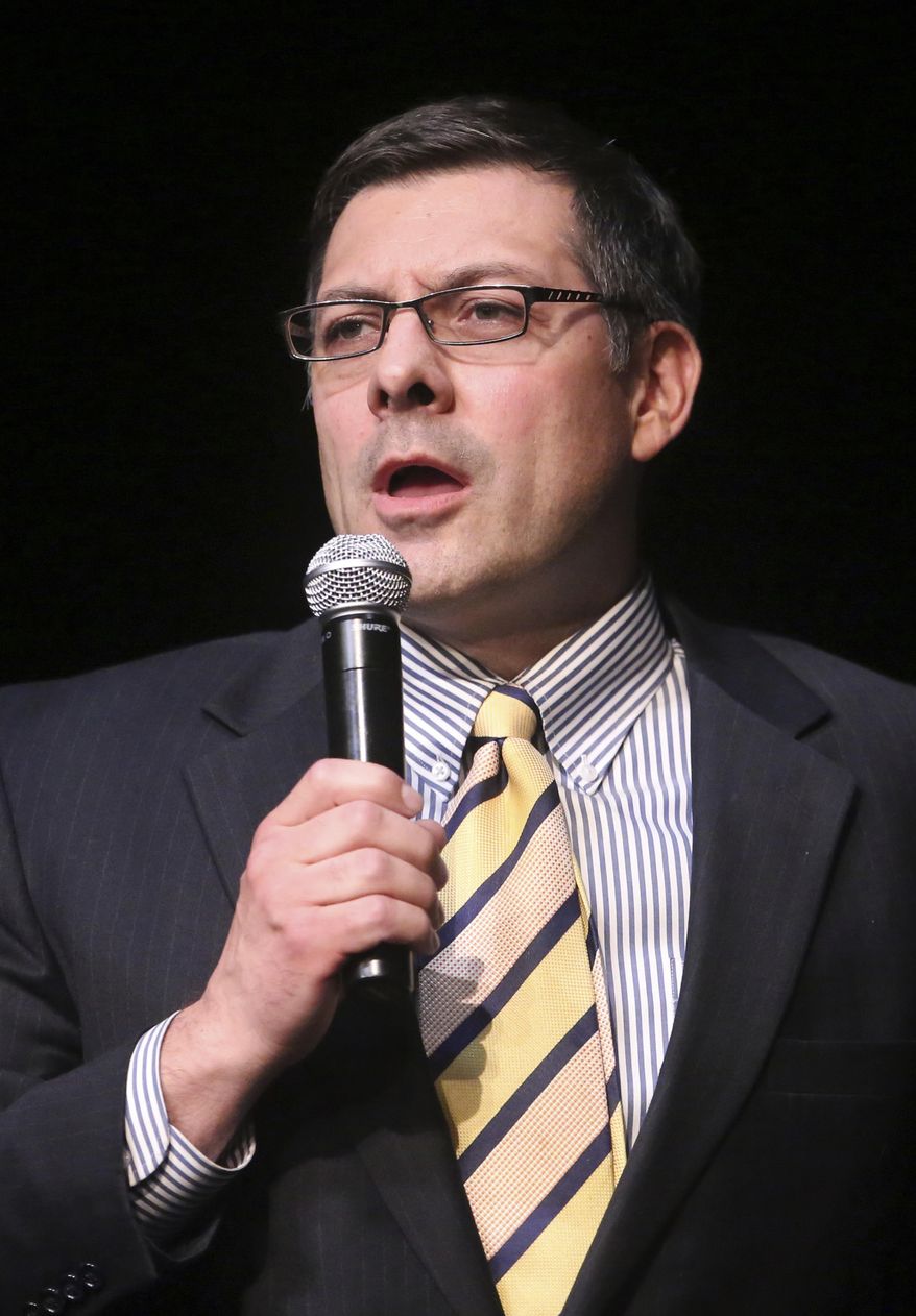 Stewart Peay, a Salt Lake City lawyer, speaks during a debate at Mountain View High School on Friday, June 16, 2017, in Orem, Utah, on the eve of a Utah GOP convention where delegates will winnow the crowded field. (AP Photo/Rick Bowmer)