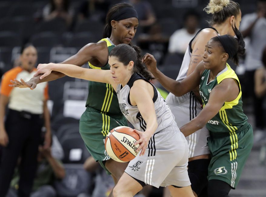 FILE - In this June 6, 2017, file photo, San Antonio Stars guard Kelsey Plum drives with the ball during the second half of a WNBA basketball game against the Seattle Storm in San Antonio. Plum returns to her college hometown of Seattle this weekend when San Antonio faces Seattle on Sunday. It&#39;s a return to the city where Plum developed into the NCAA all-time record holder in scoring at Washington and it will be Plum&#39;s first trip back to Seattle since being drafted No. 1 overall by the Stars. (AP Photo/Eric Gay, File)