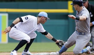 Tampa Bay Rays&#39; Corey Dickerson, right, beats the tag from Detroit Tigers second baseman Ian Kinsler to steal second base during the third inning of a baseball game, Sunday, June 18, 2017, in Detroit. (AP Photo/Duane Burleson)