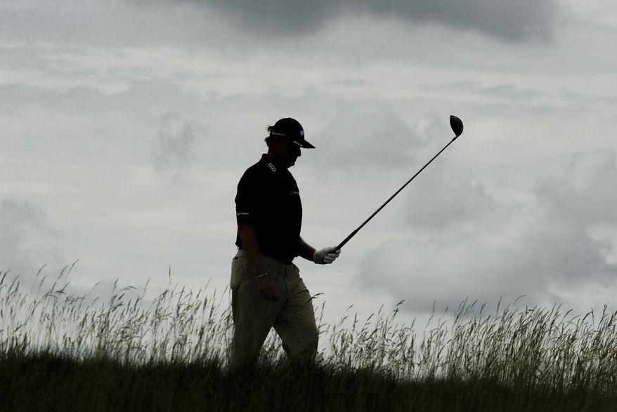 Ernie Els, of South Africa, walks on the 18th hole during the third round of the U.S. Open golf tournament Saturday, June 17, 2017, at Erin Hills in Erin, Wis. (AP Photo/A Charlie Riedel)