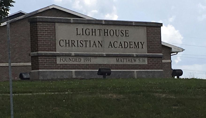 The Lighthouse Christian Academy is seen on Tuesday, June 13, 2017, in Bloomington, Ind. In its brochure the school promises an exemplary education, a caring atmosphere and a service to God _ but not for everyone. The school reserves the right to deny admission to LGBT students because it views their lifestyle as immoral. (AP Photo/Brian Slodysko)