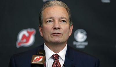 FILE -  In this Tuesday, June 2, 2015 file photo, New Jersey Devils general manager Ray Shero speaks during a NHL hockey news conference introducing John Hynes as the team&#39;s new head coach in Newark, N.J. If anyone needs the No. 1 pick in the NHL Draft, it’s the New Jersey Devils. After making the playoffs for 20 of 22 seasons, the Devils have fallen on hard times. They have missed the postseason for the last five seasons and they are coming off their worst season in nearly three decades.(AP Photo/Julio Cortez, File)