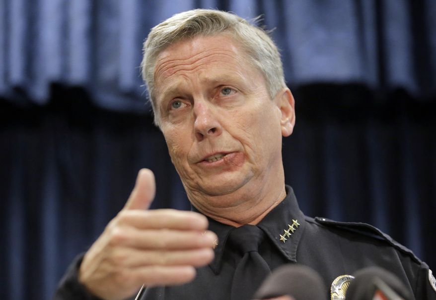 Sandy Police Chief Kevin Thacker speaks to reporters during a news conference Tuesday, June 20, 2017, in Sandy, Utah. Thacker, a suburban Salt Lake City police chief addressed questions raised about how his department handled a stalking report made by a woman three days before her ex-boyfriend killed her and her son in an attack that also injured two children. (AP Photo/Rick Bowmer)