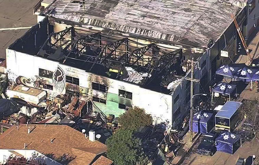 FILE- This Dec. 3, 2016 file image from video provided by KGO-TV shows the Ghost Ship Warehouse after a fire swept through the Oakland, Calif., building. More than six months after the Dec. 2 blaze at the warehouse that authorities said was illegally converted into living quarters, the Oakland Fire Department has released a 50-page report filled with harrowing details of death and panic as the flames and deadly smoke spread. The report contains many previously unknown details about the nation's deadliest structure fire in more than 14 years and says investigators could not determine the cause of the blaze due to extensive fire damage. (KGO-TV via AP, File)