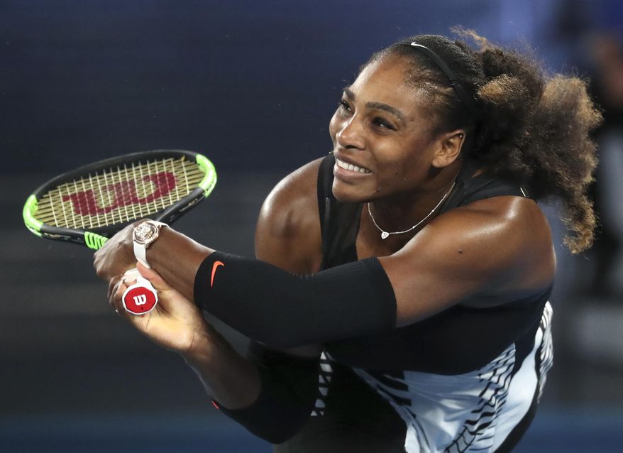 FILE - In this Saturday, Jan. 28, 2017 file photo, United States&#x27; Serena Williams makes a backhand return to her sister Venus during the women&#x27;s singles final at the Australian Open tennis championships in Melbourne, Australia. Olympic swimmer Michael Phelps and Oklahoma City Thunder star Russell Westbrook are among the finalists for best male athlete at the ESPY Awards. Tennis star Serena Williams and gymnast Simone Biles are two of the finalists for best female athlete. (AP Photo/Aaron Favila, File)