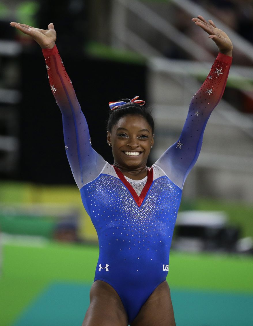 FILE - In this Tuesday, Aug. 16, 2016 file photo, United States&#39; Simone Biles completes her routine on the floor during the artistic gymnastics women&#39;s apparatus final at the 2016 Summer Olympics in Rio de Janeiro, Brazil. Olympic swimmer Michael Phelps and Oklahoma City Thunder star Russell Westbrook are among the finalists for best male athlete at the ESPY Awards.Tennis star Serena Williams and gymnast Simone Biles are two of the finalists for best female athlete. (AP Photo/Rebecca Blackwell, File)