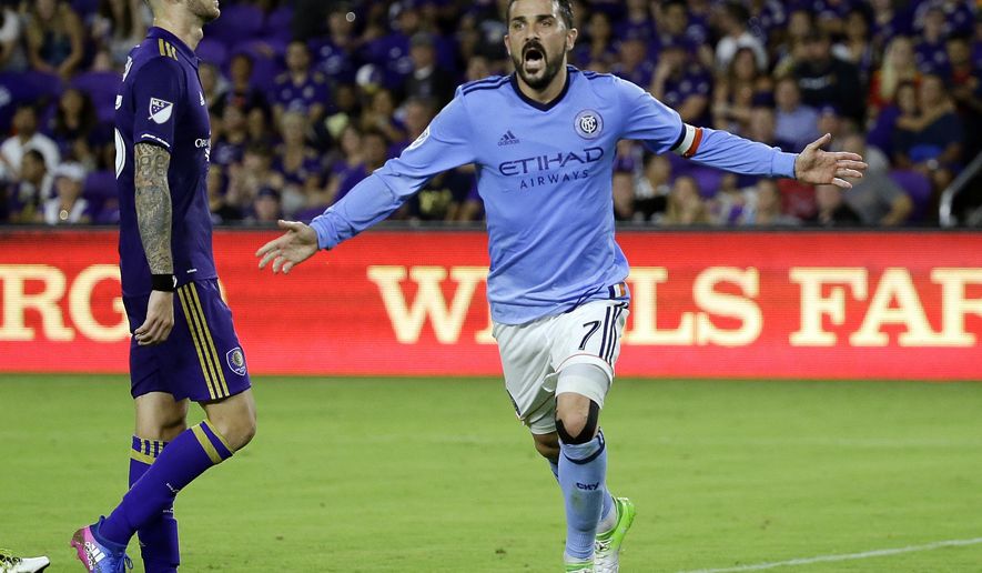 FILE - In this Sunday, May 21, 2017 file photo, New York City FC&#39;s David Villa (7) celebrates his second-half goal as he runs past Orlando City&#39;s Leo Pereira, left, in an MLS soccer game in Orlando, Fla. It’s Rivalry Week for Major League Soccer with three marquee matchups set for this weekend. The Hudson River Derby between the Red Bulls and NYCFC on Saturday, June 24, 2017 has been grabbing much of the attention. (AP Photo/John Raoux, File)