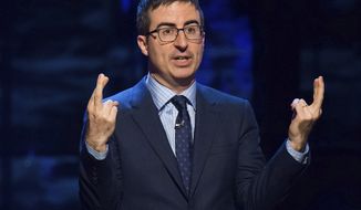 In this Feb. 28, 2015, file photo, John Oliver speaks in New York. Coal company Murray Energy is suing HBO and its Sunday-night host, John Oliver, for what it says was a false and malicious broadcast. Oliver&#39;s 24-minute &quot;Last Week Tonight&quot; coal segment on Sunday, June 18, 2017, criticized the Trump&#39;s administration effort to revive the industry and ribbed Murray Energy&#39;s CEO. (Photo by Charles Sykes/Invision/AP, File)