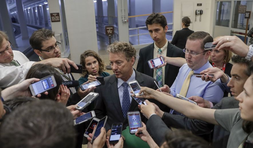 Sen. Rand Paul, R-Ky., speaks to reporters at the Capitol after Republicans released their long-awaited bill to scuttle much of President Barack Obama&#x27;s Affordable Care Act, at the Capitol in Washington, Thursday, June 22, 2017. He is one of four GOP senators to say they are opposed it but are open to negotiations, which could put the measure in immediate jeopardy. (AP Photo/J. Scott Applewhite) )