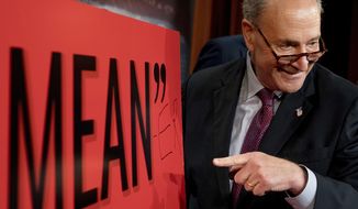 Senate Minority Leader Chuck Schumer, D-N.Y., writes &quot;Mean-er&quot; on a reported quote by President Donald Trump as Schumer responds to the release of the Republicans&#39; healthcare bill which represents the long-awaited attempt to scuttle much of President Barack Obama&#39;s Affordable Care Act, at the Capitol in Washington, Thursday, June 22, 2017. (AP Photo/Andrew Harnik)