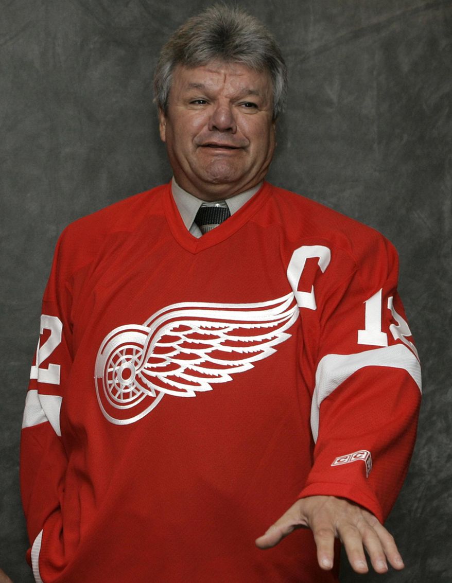 FILE - In this Nov. 6, 2006, file photo, former Detroit Red Wings and NHL Hall of Fame player Marcel Dionne gestures during a press conference in Detroit. Three-time Olympic gold medal gymnast Aly Raisman endured an awkward moment on stage at the NHL awards show after Hall of Fame hockey star Marcel Dionne complimented her legs. Raisman and Dionne were on stage together Wednesday night, June 21, 2017, to present the Lady Byng Trophy for gentlemanly play. During their pre-award patter, Dionne praised Raisman's gymnastic success and then made a sweeping gesture toward Raisman, saying: "Look at those legs!" (AP Photo/Paul Sancya, File)