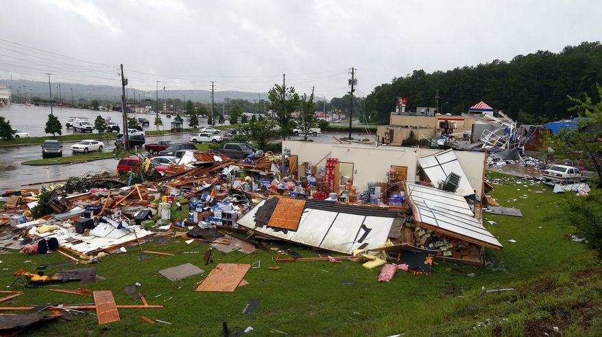 A possible tornado touched down destroying several businesses, Thursday, June 22, 2017, in Fairfield, Ala. Alabama Gov. Kay Ivey says the threat of severe weather has not concluded as the remnants of Tropical Storm Cindy pushes inland. Ivey in a Thursday press briefing urged people to stay vigilant. (AP Photo/Butch Dill)