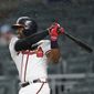 Atlanta Braves&#39; Brandon Phillips (4) drives in a run with a double during the fifth inning of the team&#39;s baseball game against the Milwaukee Brewers on Friday, June 23, 2017, in Atlanta. (AP Photo/John Bazemore)
