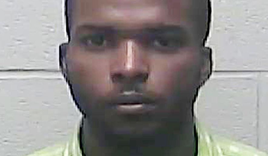 FILE - This undated file photo provided by Burleigh County Sheriff's Department in Bismarck, N.D. shows Lavrick Willocks, who is among 10 defendants awaiting trial in a multimillion-dollar Jamaican lottery scam. Authorities allege Willocks was the mastermind in the scam that bilked at least 90 mostly elderly Americans out of more than $5.7 million. Federal Judge Dan Hovland has rescheduled the trial that was to begin July 17, 2017 in North Dakota to Jan. 22, 2018. (Burleigh County Sheriff's Department via AP, File)