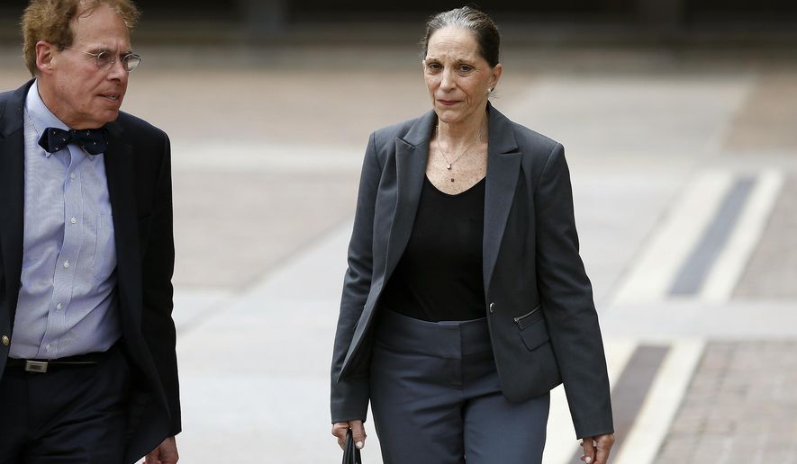 Renee Tartaglione leaves the federal courthouse in Philadelphia, Friday, June 23, 2017. Tartaglione, a member of a politically connected Philadelphia family, has been convicted of defrauding a nonprofit mental health clinic out of about $1 million for her personal benefit. A U.S. District Court jury convicted Tartaglione Friday on all counts of conspiracy, theft, fraud and tax evasion. (David Maialetti /The Philadelphia Inquirer via AP)