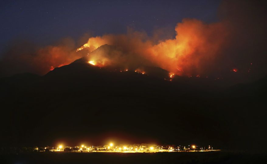 The Frye Fire burns the western edge of the Pinaleño Mountains in Coronado National Forest above Ft. Grant Prison near Willcox, Ariz. on Thursday, June 22, 2017. The lightning-caused fire is now at nearly 29,000 acres. More than 800 personnel are assigned to the fire. (Kelly Presnell /Arizona Daily Star via AP)