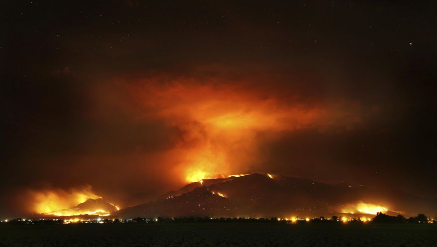 The Frye Fire burns the western edge of the Pinaleño Mountains in Coronado National Forest above Ft. Grant Prison near Willcox, Ariz. on Thursday, June 22, 2017. The lightning-caused fire is now at nearly 29,000 acres. More than 800 personnel are assigned to the fire. (Kelly Presnell /Arizona Daily Star via AP)