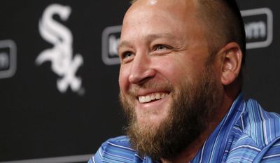 Former Chicago White Sox pitcher Mark Buehrle smiles as he responds to a question about his career with the team, during a news conference before a baseball game between his former club and the Oakland Athletics on Friday, June 23, 2017, in Chicago. Buehrle will see his No. 56 retired during ceremonies before Saturday&#39;s game. (AP Photo/Charles Rex Arbogast)