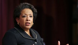 In this April 7, 2017, file photo, former U.S. Attorney General Loretta Lynch speaks during a conference on policy and blacks at Harvard University&#39;s Kennedy School of Government in Cambridge, Mass. (AP Photo/Elise Amendola, File)