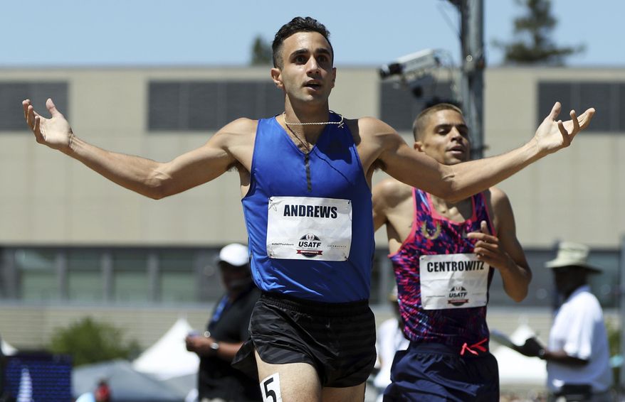 Robby Andrews, left, reacts to winning the men&#x27;s 1500 meters ahead of second-place finisher Matthew Centrowitz, right, at the U.S. Track and Field Championships, Saturday, June 24, 2017, in Sacramento, Calif. (AP Photo/Rich Pedroncelli)