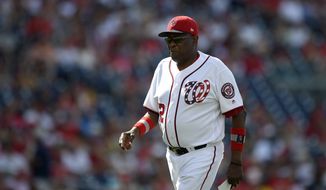 Washington Nationals manager Dusty Baker walks to the dugout after a pitching change during a baseball game against the Cincinnati Reds, Sunday, June 25, 2017, in Washington. The Reds won 6-2. (AP Photo/Nick Wass)