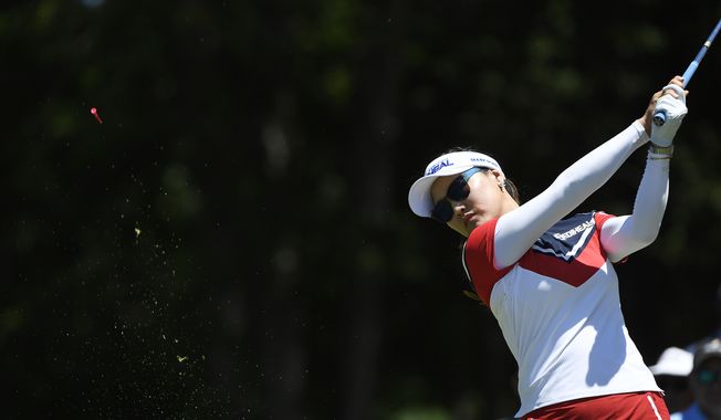 So Yeon Ryu, from Korea, watches her drive on the third hole during the third round of the LPGA Wal-Mart NW Arkansas Championship golf tournament at Pinnacle Country Club in Rogers, Ark., Sunday, June 25, 2017. (AP Photo/Michael Woods)