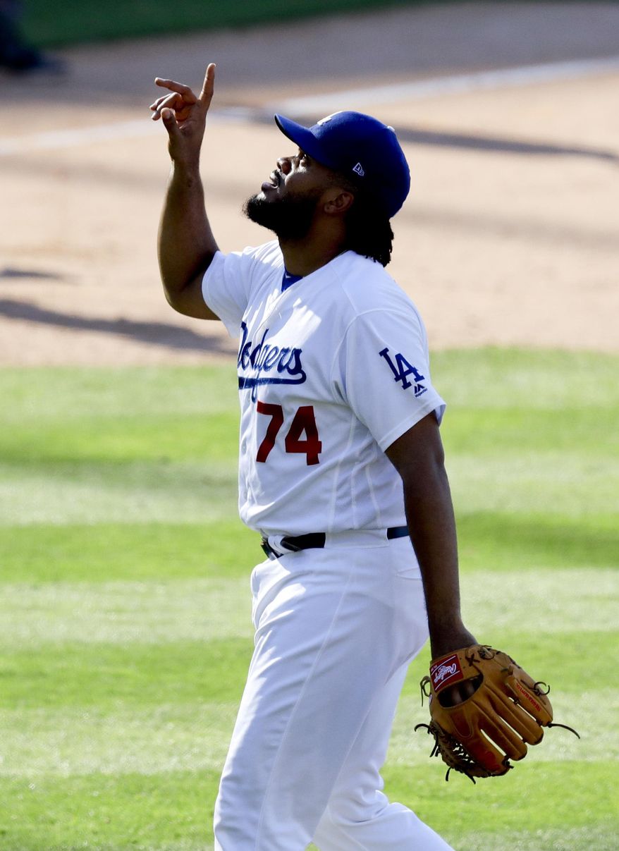 Los Angeles Dodgers relief pitcher Kenley Jansen celebrates after his teams win over the Colorado Rockies during a baseball game in Los Angeles, Sunday, June 25, 2017. (AP Photo/Chris Carlson)