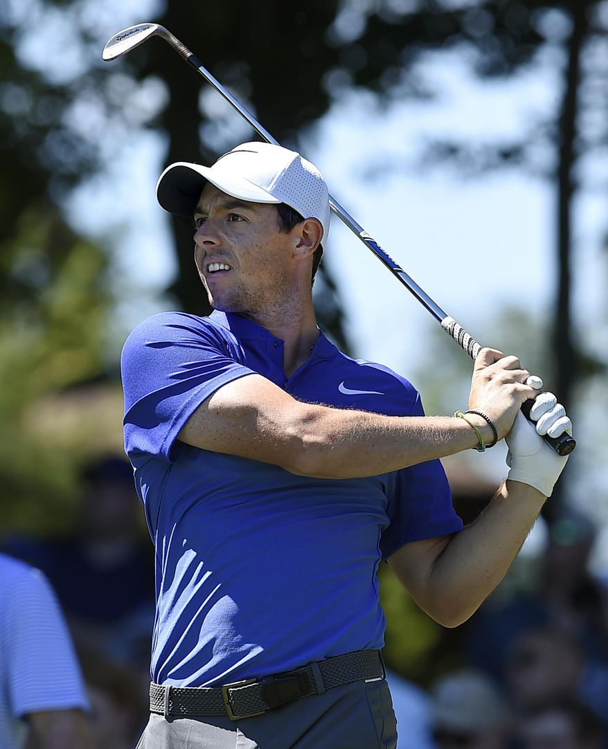 Rory McIlroy tees off the 11th hole during the final round of the Travelers Championship golf tournament, Sunday, June 25, 2017, in Cromwell, Conn. (AP Photo/Jessica Hill)