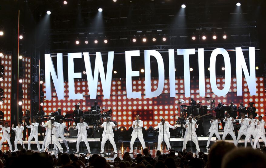 In foreground, New Edition, performs with members of the cast of The New Edition Story at the BET Awards at the Microsoft Theater on Sunday, June 25, 2017, in Los Angeles. (Photo by Matt Sayles/Invision/AP)