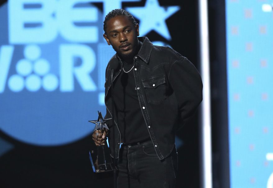 Kendrick Lamar accepts the award for best male hip-hop artist at the BET Awards at the Microsoft Theater on Sunday, June 25, 2017, in Los Angeles. (Photo by Matt Sayles/Invision/AP)