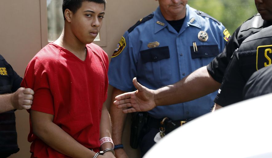 Dwan Wakefield, one of three men charged with murder in connection with the shooting death of Kingston Frazier, leaves the Madison County Justice Court on Monday, June 26, 2017, in Canton, Miss. A judge said there is probable cause to hold Wakefield and the two other Mississippi teenagers in the shooting death. (AP Photo/Rogelio V. Solis)