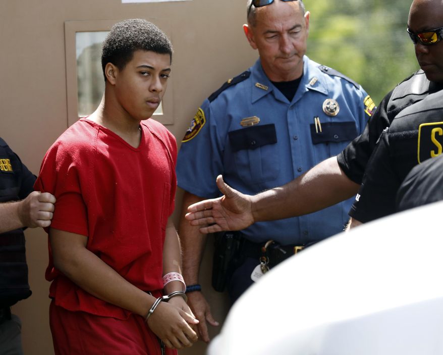 Dwan Wakefield, one of three men charged with murder in connection with the shooting death of Kingston Frazier, leaves the Madison County Justice Court on Monday, June 26, 2017, in Canton, Miss. A judge said there is probable cause to hold Wakefield and the two other Mississippi teenagers in the shooting death. (AP Photo/Rogelio V. Solis)