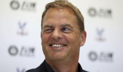 Frank De Boer smiles during a press conference at Beckenham Training Ground, Kent, Monday June 26, 2017. Former Netherlands defender Frank de Boer has been hired as manager of Crystal Palace, taking his first coaching job in English soccer seven months after getting fired by Inter Milan. (Steven Paston/PA via AP)