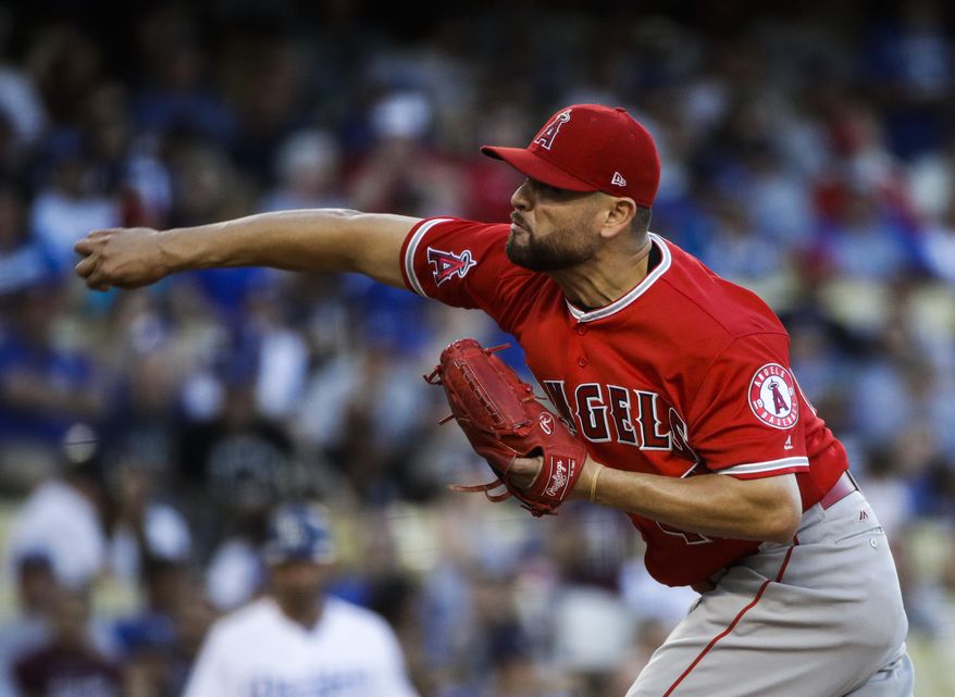 Los Angeles Angels starting pitcher Ricky Nolasco throws against the Los Angeles Dodgers during the first inning of a baseball game, Monday, June 26, 2017, in Los Angeles. (AP Photo/Jae C. Hong)