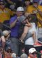 cws_finals_fan_stricken_baseball_03937.jpg