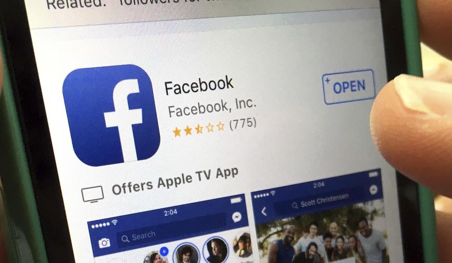This Monday, June 19, 2017, photo shows Facebook launched on an iPhone, in North Andover, Mass. Facebook says it deleted about 66,000 posts a week in the last two months as the social media giant seeks to crack down on what it considers to be hateful posts. Facebook says it defines hate speech as attacks on people based on their race, sexual orientation and other “protected characteristics.” (AP Photo/Elise Amendola) ** FILE **