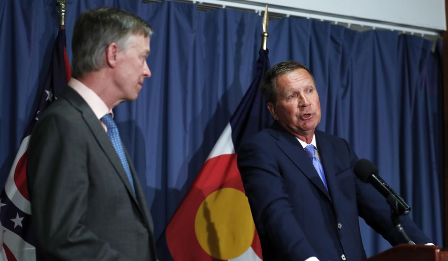 Ohio Gov. John Kasich, right, joined by Colorado Gov. John Hickenlooper, speaks during a news conference at the National Press Club in Washington, Tuesday, June 27, 2017, about Republican legislation overhauling the Obama health care law. (AP Photo/Carolyn Kaster) ** FILE **