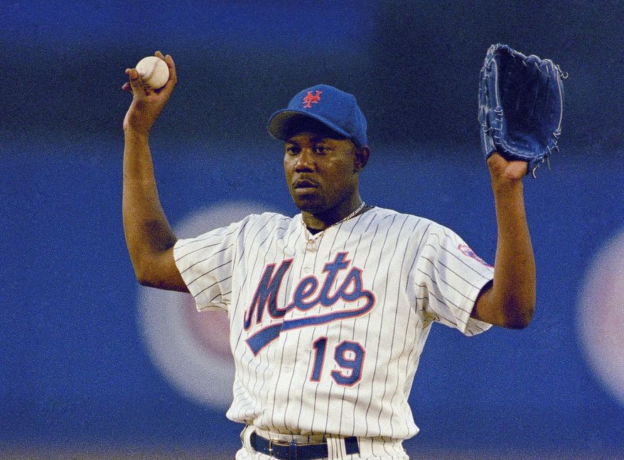 FILE - In this June 22, 1993, file photo, New York Mets pitcher Anthony Young calls for a a new ball during the team's baseball game against the Montreal Expos in New York. Young, who set a major league record with 27 straight losses, has died. He was 51.The Mets said Young died Tuesday, June 27, 2017, in Houston after a long illness. He had told former teammates this spring that he had a brain tumor. (AP Photo/Ron Frehm, File)