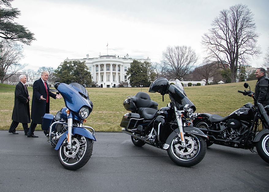 President Donald Trump and Vice President Mike Pence admire several Harley Davidson bikes on the South Lawn driveway of the White House in Washington, D.C. President Trump hosted a lunch for Harley Davidson executives, as well as union representatives for machinist and steel workers, in the Roosevelt Room of the White House in Washington, D.C., Thursday, February 2, 2017. (Official White House Photo by Shealah Craighead)