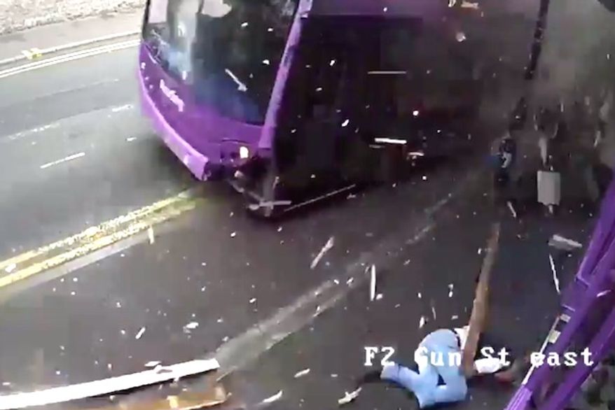 Simon Smith, 53, is hit by a bus in Berkshire, England, June 24, 2017. The pedestrian stood up after the impact and calmly walked into a nearby pub. (BBC screenshot)